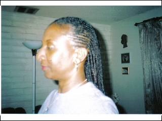 cornrows in front and singles in back I did