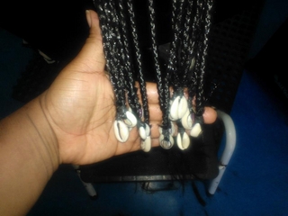 cornrow design i did with cowrey shells