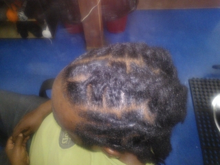 locs cornrowed