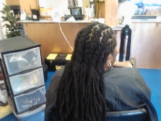 dreadlocks i did cornrowed back and some left loose